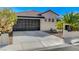 Well-maintained home with a spacious driveway and attached two-car garage at 9995 Yellow Canary Ave, Las Vegas, NV 89117