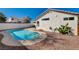 Private backyard with a clear blue swimming pool, ideal for leisure at 9995 Yellow Canary Ave, Las Vegas, NV 89117