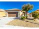 Inviting single-story house featuring a well-kept yard and a two-car garage at , Las Vegas, NV 89122