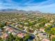 Stunning aerial view of the community, highlighting its well-planned streets and lush greenery at 10528 Meadow Mist Ave, Las Vegas, NV 89135