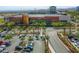 An aerial view displays the City National Arena with parking, landscaping, and surrounding buildings at 10528 Meadow Mist Ave, Las Vegas, NV 89135