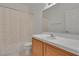 Bathroom features tile counters, a shower, and a large mirror at 107 Topsail Dr, Boulder City, NV 89005