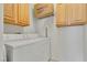 Laundry room with washer, dryer, and overhead storage at 107 Topsail Dr, Boulder City, NV 89005