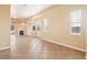 Bright and airy living room featuring tile floors, neutral paint, and large windows at 10765 Muscari Way, Las Vegas, NV 89141