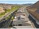 Panoramic aerial view of rooftops, desert landscape, and homes in the area at 108 Kimberlite Dr, Henderson, NV 89011