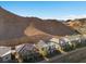 Stunning aerial view of modern homes nestled against a picturesque mountain backdrop at 108 Kimberlite Dr, Henderson, NV 89011