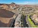 Breathtaking aerial capture of the neighborhood's curved streets and mountain views at 108 Kimberlite Dr, Henderson, NV 89011