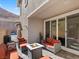 Cozy patio featuring an outdoor seating area with a fire pit and view at 108 Kimberlite Dr, Henderson, NV 89011