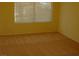 Bedroom with neutral carpet, and a window letting in natural light at 108 Zenith Point Ave, North Las Vegas, NV 89032