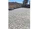 Newly laid paver patio with level seating area, ready for outdoor enjoyment at 117 Forest Ln, Boulder City, NV 89005