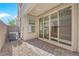 Small backyard with gravel and sliding glass doors at 11713 Redwood Mountain Ave, Las Vegas, NV 89138