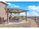 Relaxing gazebo with picnic tables, offering scenic views at 11713 Redwood Mountain Ave, Las Vegas, NV 89138