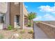 Modern home with teal front door, walkway, and distant mountain views at 11713 Redwood Mountain Ave, Las Vegas, NV 89138