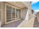 Private backyard patio with sliding glass doors and brick pavers at 11713 Redwood Mountain Ave, Las Vegas, NV 89138