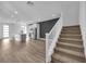 Modern staircase leading upstairs, view from living room at 11713 Redwood Mountain Ave, Las Vegas, NV 89138