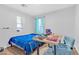 Bedroom featuring a bed, desk, and bright natural light at 11908 Love Orchid Ln, Las Vegas, NV 89138