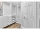 Walk-in closet with custom shelves and drawers for optimal storage at 11908 Love Orchid Ln, Las Vegas, NV 89138