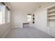 This bedroom features a built in desk with shelving and storage, and bright neutral walls at 12 Hilltop Crest St, Henderson, NV 89011