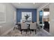 Bright dining room with sliding glass doors to the patio at 12 Hilltop Crest St, Henderson, NV 89011