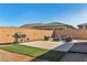 Outdoor barbecue area with grill and patio furniture, perfect for entertaining at 136 Mosso Niente Pl, Henderson, NV 89011