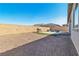 Backyard featuring a BBQ, hardscape, turf, and perimeter wall at 136 Mosso Niente Pl, Henderson, NV 89011