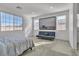 Bright bedroom with large windows, a comfortable bed, and modern furnishings at 136 Mosso Niente Pl, Henderson, NV 89011