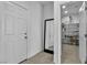 Hallway with a view of a well-organized pantry and easy access to storage and utility areas at 136 Mosso Niente Pl, Henderson, NV 89011