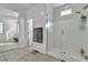 Bathroom showcases shower with transparent glass door and white tile surround at 136 Mosso Niente Pl, Henderson, NV 89011