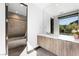 Bathroom with walk-in shower, tub and modern vanity with white countertop at 1786 Diamond Rim Ct, Henderson, NV 89012