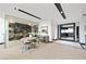 Modern dining area features a temperature-controlled wine room and seamless access to the entryway at 1786 Diamond Rim Ct, Henderson, NV 89012