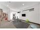 Modern exercise room with sleek workout bench, dumbbells, exercise ball and mirrored doorway at 1786 Diamond Rim Ct, Henderson, NV 89012