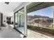 Hallway leading to a balcony overlooking the hillside at 1786 Diamond Rim Ct, Henderson, NV 89012