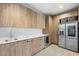 Modern kitchenette featuring sleek cabinetry and stainless steel appliances at 1786 Diamond Rim Ct, Henderson, NV 89012