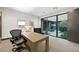 Office space with a large desk, comfortable chairs and great natural light at 1786 Diamond Rim Ct, Henderson, NV 89012