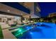 Inviting pool area with modern lounge chairs, a covered patio, and seamless indoor-outdoor living at 1786 Diamond Rim Ct, Henderson, NV 89012