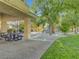 Shaded picnic area near a playground with slide and play structure offers community fun at 1851 Hillpointe Rd # 2124, Henderson, NV 89074