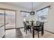 Bright dining area featuring a modern light fixture and natural light at 216 Copland Canyon Ave, Henderson, NV 89011