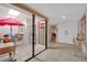 Well lit entryway space with tiled floors leading to skylight patio, and front door at 2541 La Cara Ave, Las Vegas, NV 89121