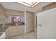 Bright kitchen with granite countertops and view to the dining room at 2541 La Cara Ave, Las Vegas, NV 89121