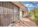 A shaded patio features outdoor seating and a brick floor at 2541 La Cara Ave, Las Vegas, NV 89121