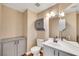 Cozy bathroom with modern fixtures, a large mirror, updated cabinets, and ample storage space at 2737 Sunrise Day Ct, Las Vegas, NV 89142