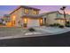 Two-story home boasting an attached garage and well-maintained landscaping at 2737 Sunrise Day Ct, Las Vegas, NV 89142