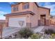 Delightful two-story home with a well-kept yard and a welcoming entrance at 2737 Sunrise Day Ct, Las Vegas, NV 89142