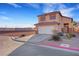 Lovely two-story home with a clean driveway and simple desert landscaping at 2737 Sunrise Day Ct, Las Vegas, NV 89142