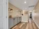 Hallway featuring wood-look flooring and built in cabinets at 2737 Sunrise Day Ct, Las Vegas, NV 89142