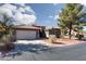 Beautiful single-story home with desert landscaping and a convenient two-car garage at 2987 Matese Dr, Henderson, NV 89052