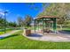 Picturesque park area with picnic tables, a barbecue grill, and a shaded gazebo at 2987 Matese Dr, Henderson, NV 89052