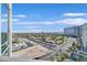 Expansive city view from the balcony showcasing the skyline and distant mountains under a clear blue sky at 322 Karen Ave # 1101, Las Vegas, NV 89109