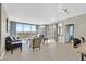 Spacious living room with floor-to-ceiling windows and stunning city views at 322 Karen Ave # 1101, Las Vegas, NV 89109