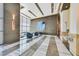 Luxury building lobby with modern seating, wood panel walls, and marble floors at 322 Karen Ave # 1101, Las Vegas, NV 89109